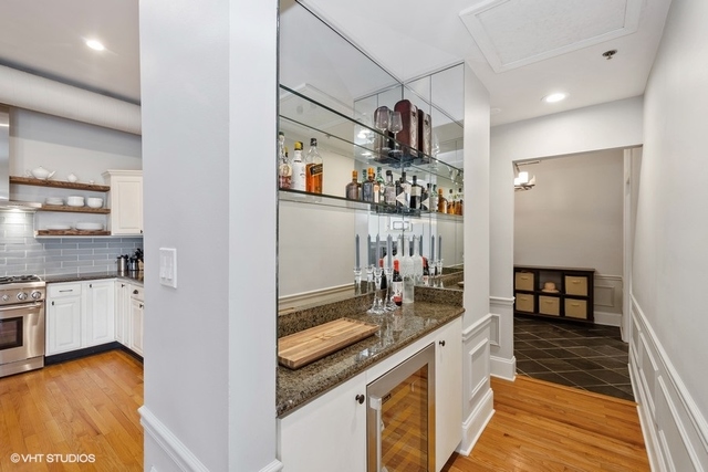 1016 West Madison Street, Unit 3S Chicago, IL 60607 - Photo 20 of 22 a kitchen with stainless steel appliances granite countertop a sink and cabinets