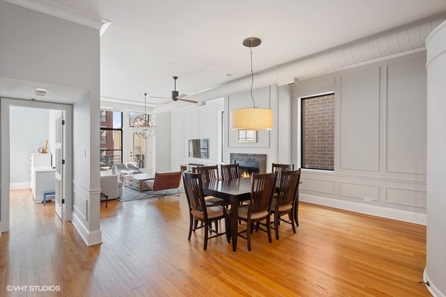 1016 West Madison Street, Unit 3S Chicago, IL 60607 - Photo 10 of 22 a view of a dining room with furniture window and wooden floor