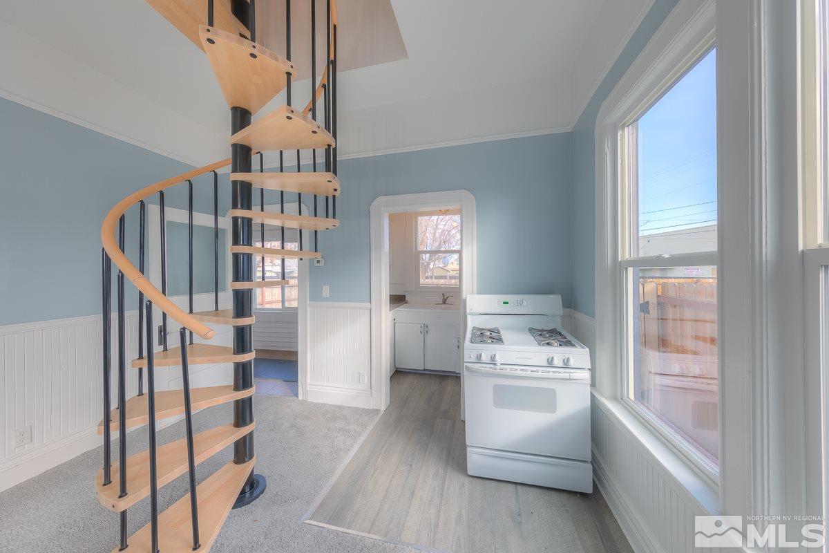 614 Elko Avenue Reno, NV 89512 - Photo 4 of 24 a view of entryway and hall with wooden floor