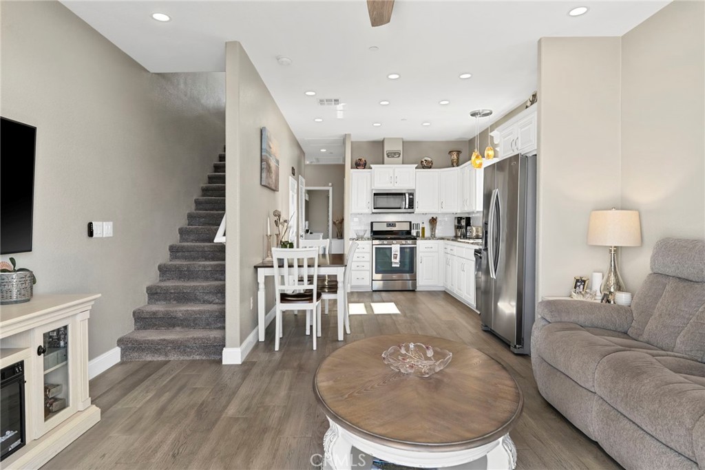48 Riversea Road Seal Beach, CA 90740 - Photo 20 of 34 a living room with furniture and wooden floor