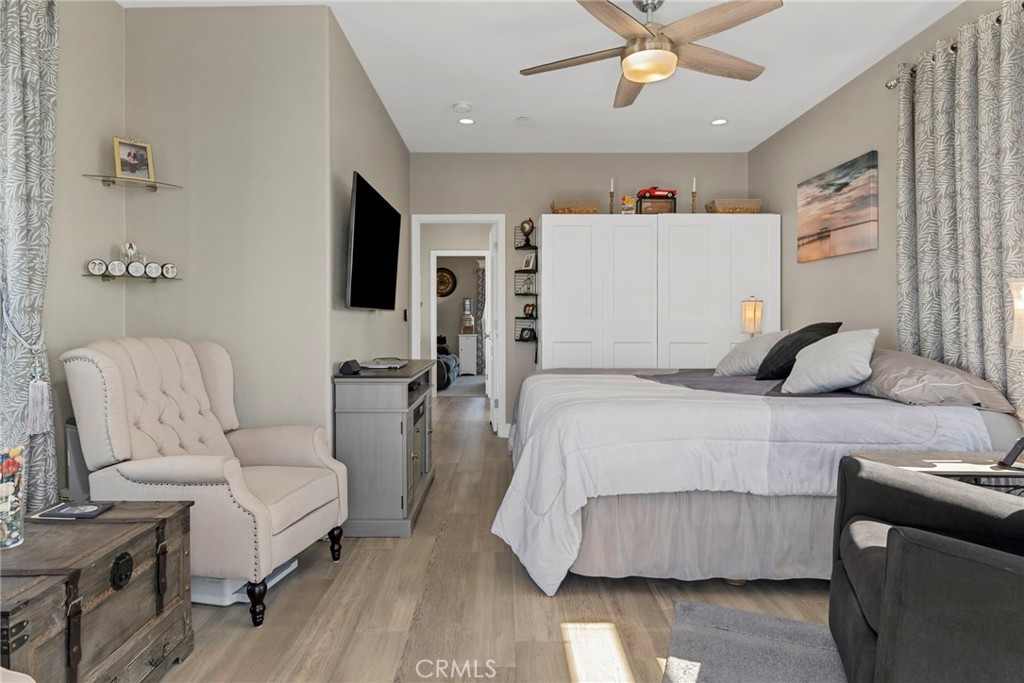 48 Riversea Road Seal Beach, CA 90740 - Photo 27 of 34 a bedroom with a bed and a couch