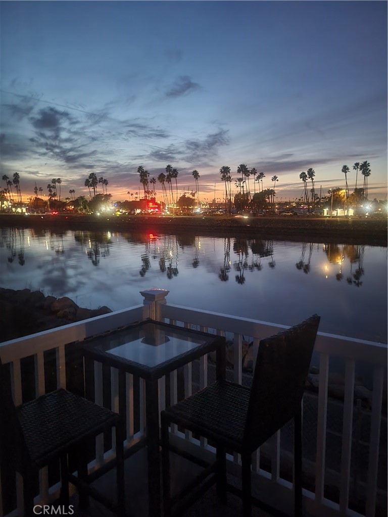 48 Riversea Road Seal Beach, CA 90740 - Photo 34 of 34 a view of a chairs and table in patio