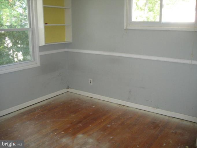 3510 Edwin Street Silver Spring, MD 20902 - Photo 3 of 8 an empty room with a window