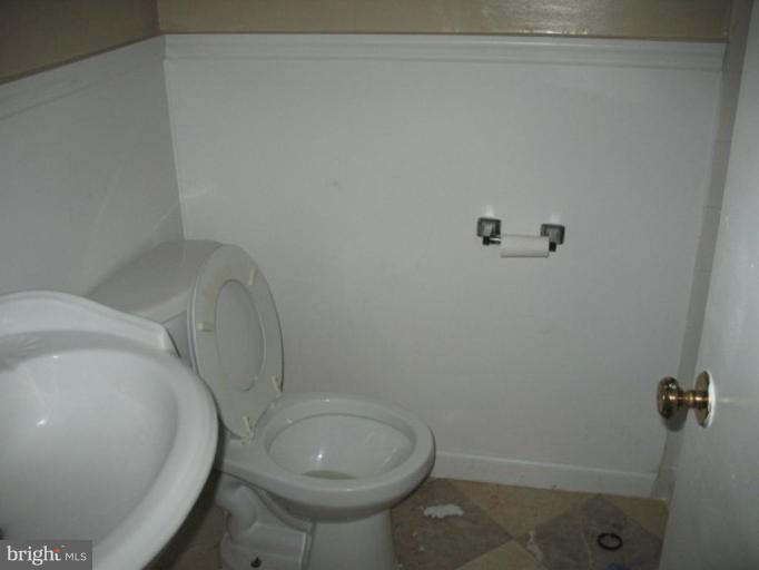 3510 Edwin Street Silver Spring, MD 20902 - Photo 6 of 8 a bathroom with a toilet and a sink