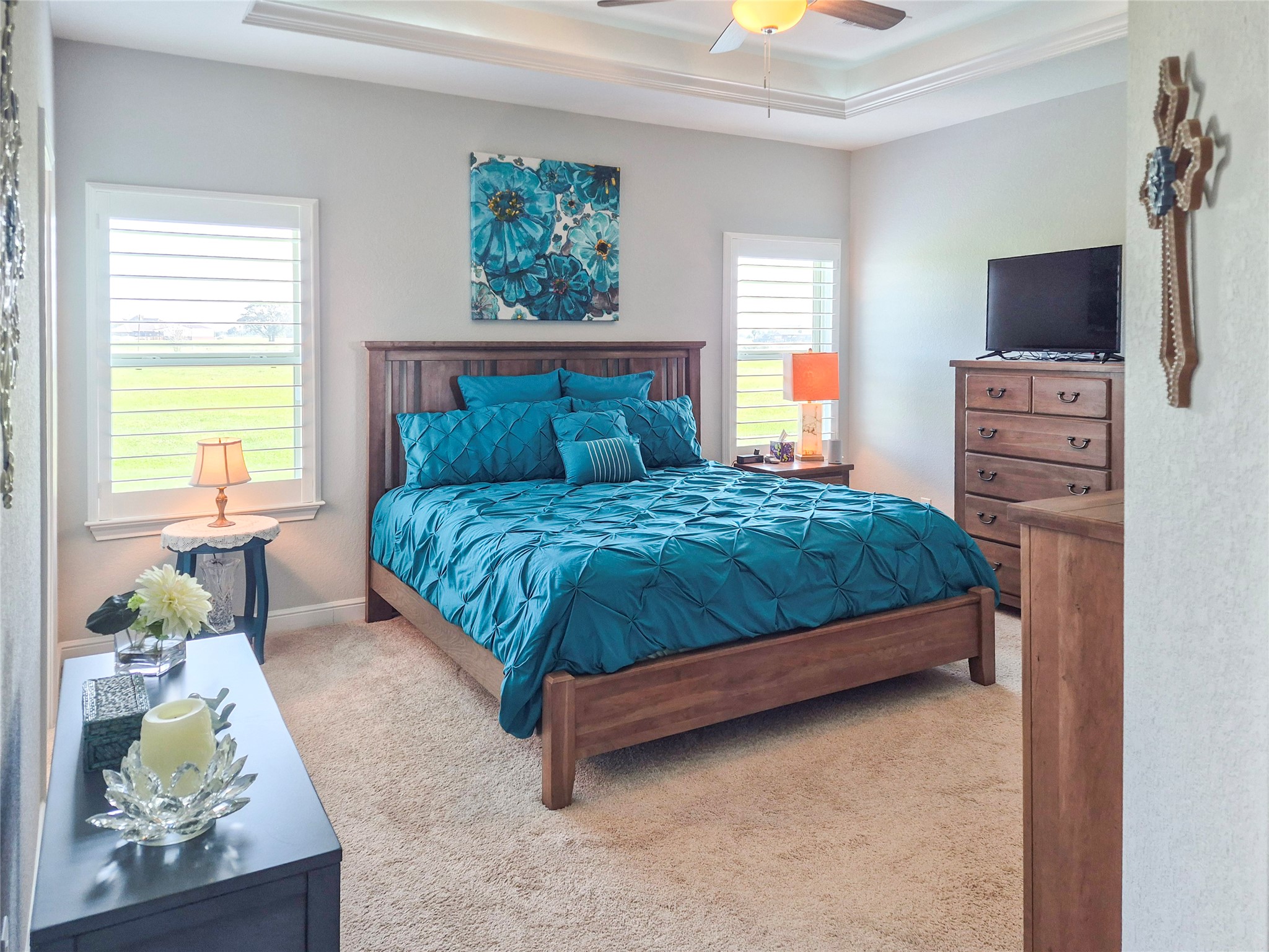 1325 Palomino Trail Angleton, TX 77515 - Photo 12 of 36 a bedroom with a bed furniture and a flat screen tv