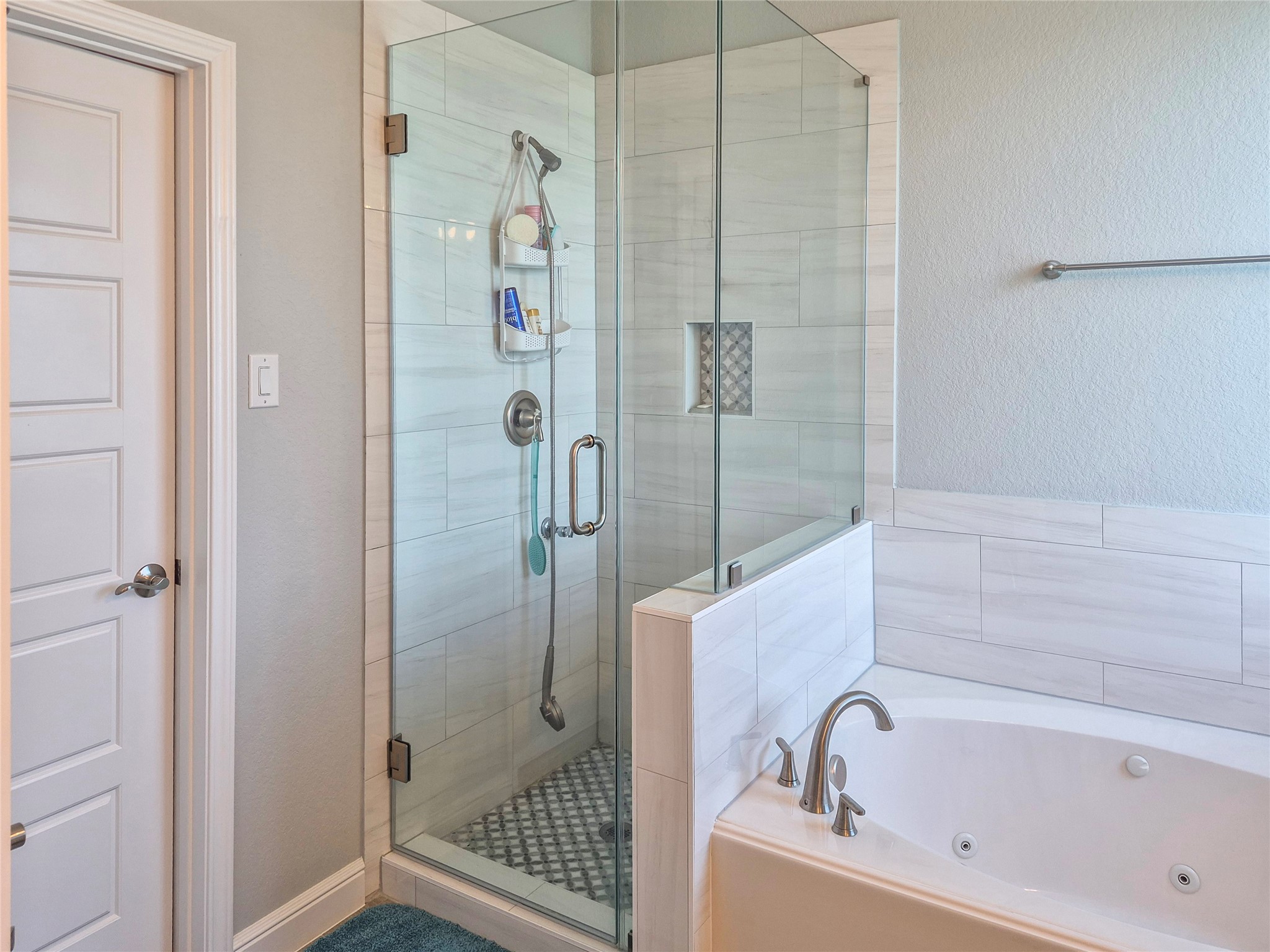 1325 Palomino Trail Angleton, TX 77515 - Photo 14 of 36 a bathroom with a bathtub and shower