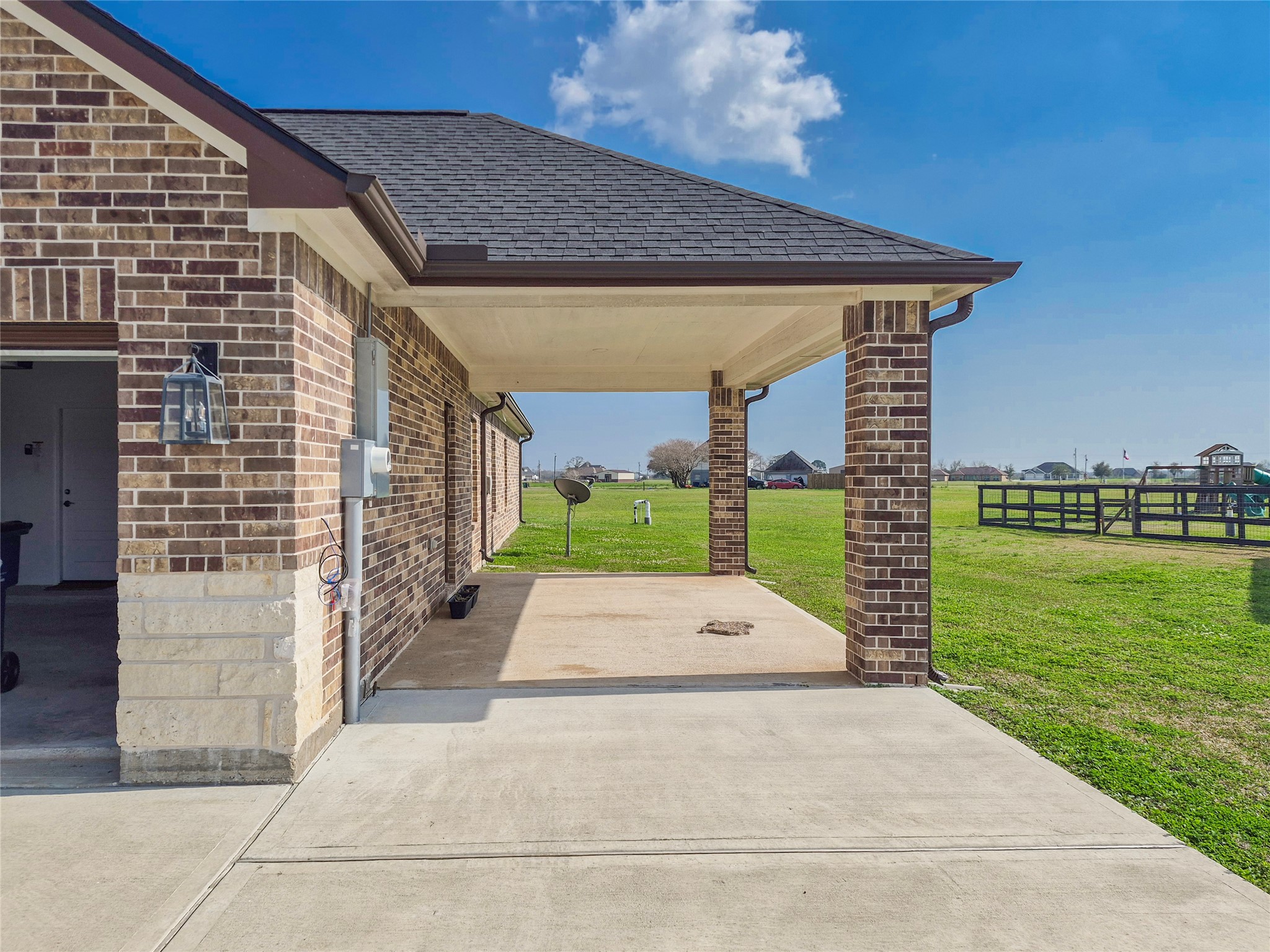 1325 Palomino Trail Angleton, TX 77515 - Photo 21 of 36 a view of backyard with plants and lake view