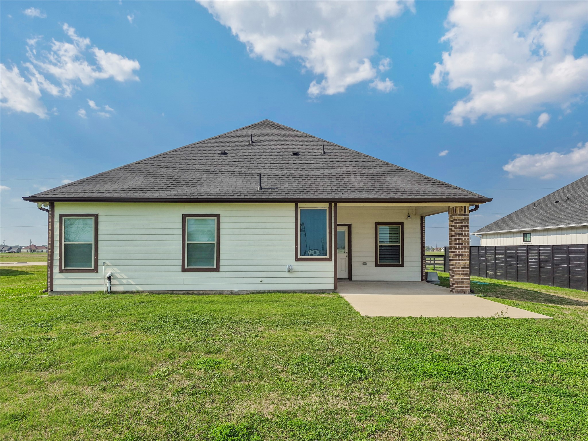 1325 Palomino Trail Angleton, TX 77515 - Photo 23 of 36 a front view of a house with a yard and garage