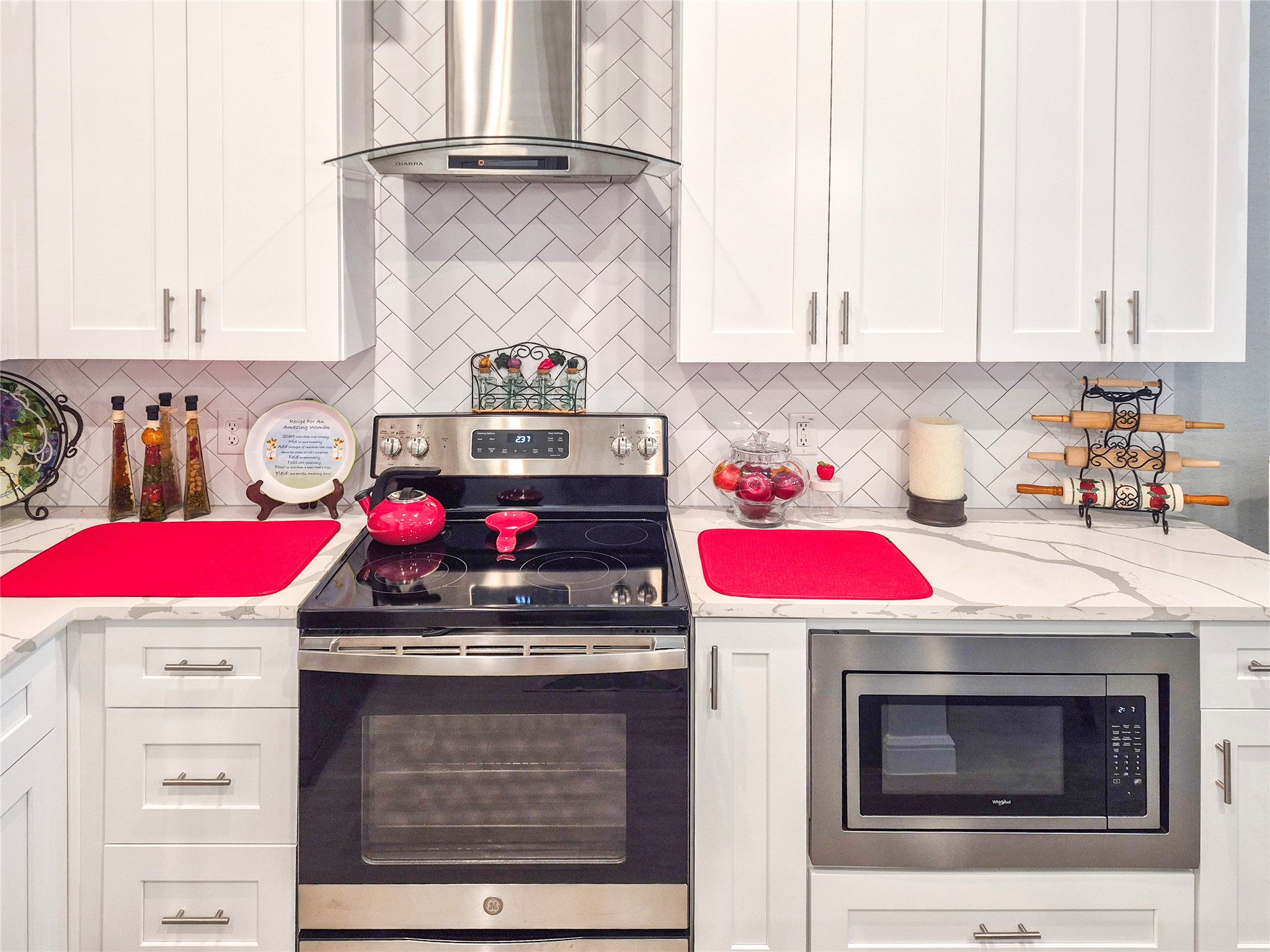 1325 Palomino Trail Angleton, TX 77515 - Photo 5 of 36 a kitchen with a stove and a microwave