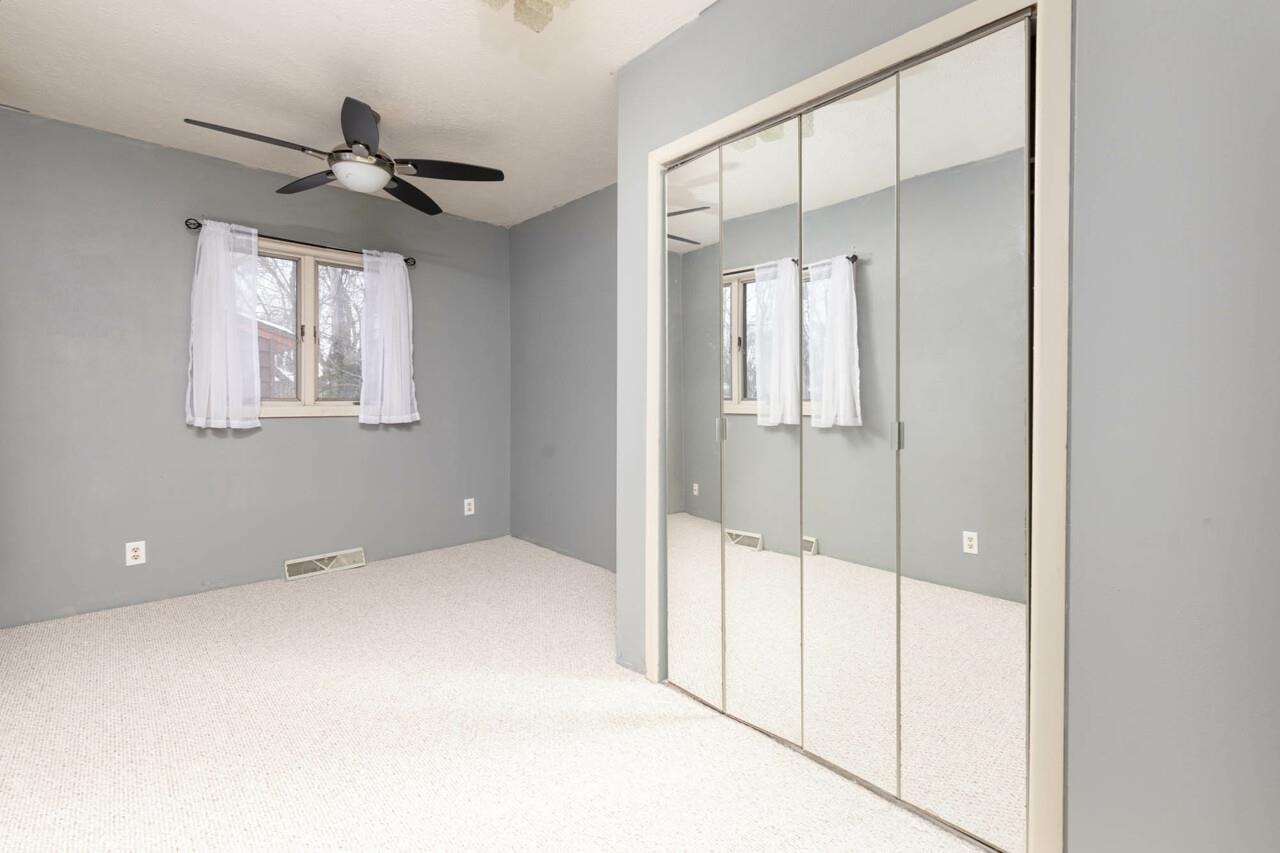 7401 Randy Road Machesney Park, IL 61115 - Photo 20 of 27 a view of an empty room with a window