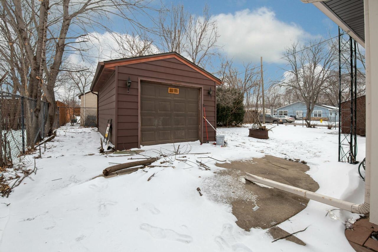 7401 Randy Road Machesney Park, IL 61115 - Photo 26 of 27 a view of a house with snow on the road