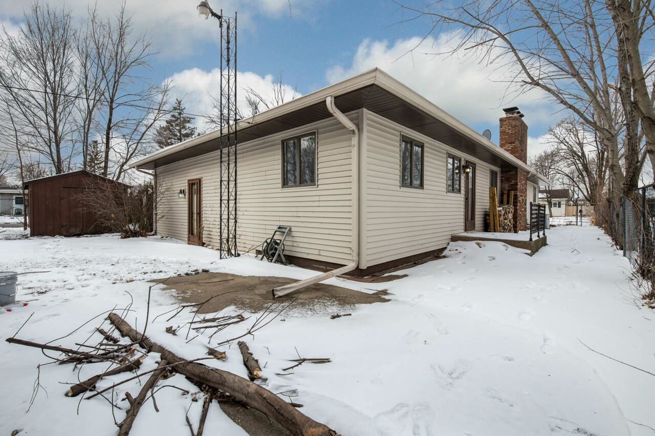 7401 Randy Road Machesney Park, IL 61115 - Photo 27 of 27 a front view of a house with a yard