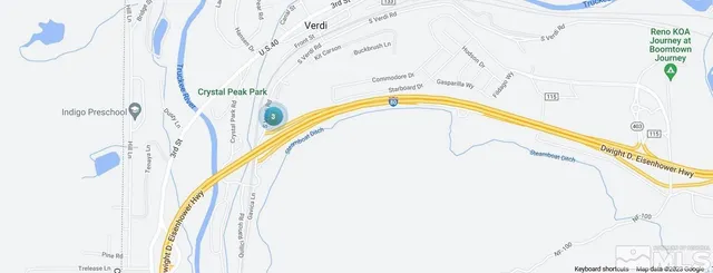 a view of a road with an ocean view