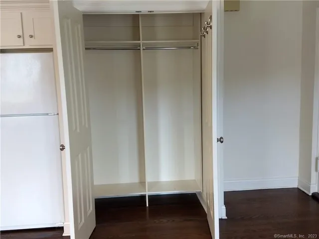 a view of an empty walk in closet