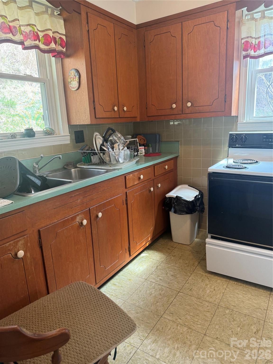 1820 Grapevine Road Marshall, NC 28753 - Photo 46 of 48 a kitchen with sink and window