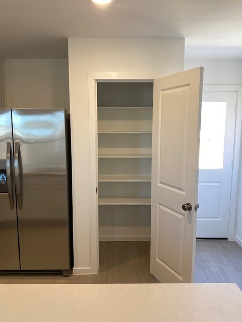 5283 Israel Grace Way Houston, TX 77048 - Photo 12 of 27 Kitchen pantry