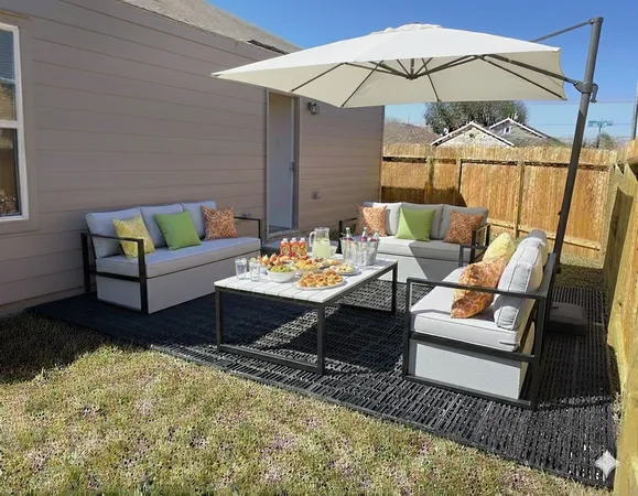 a outdoor living room with furniture