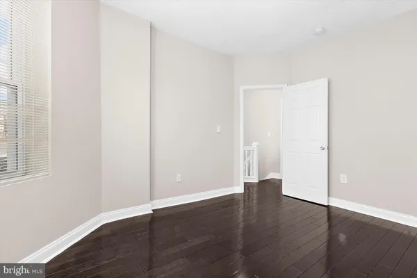 a bathroom with a toilet a sink and a bathtub