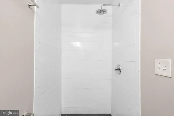 a bathroom with a toilet and a sink