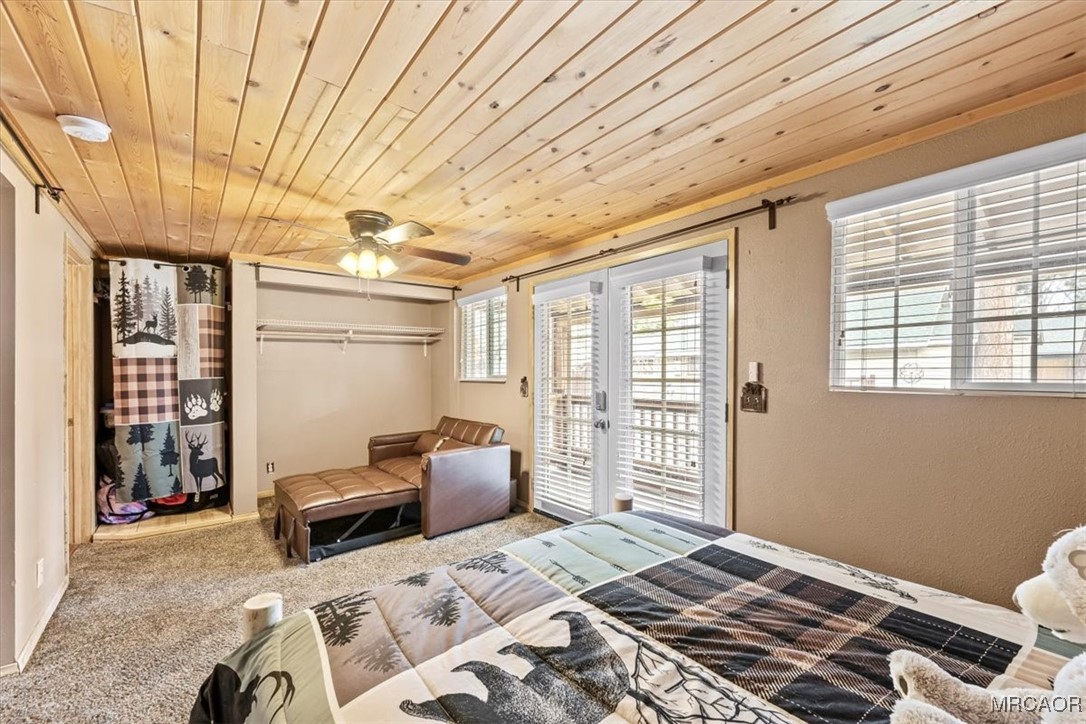 44361 Silver Pine Road Sugarloaf, CA 92386 - Photo 13 of 20 a bedroom with furniture and window