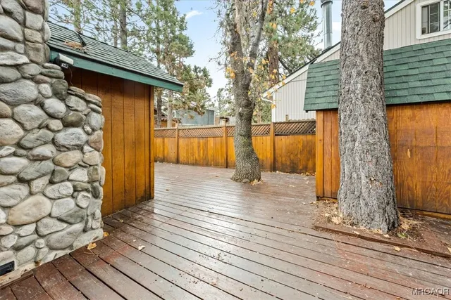 a door of a house with wooden floor