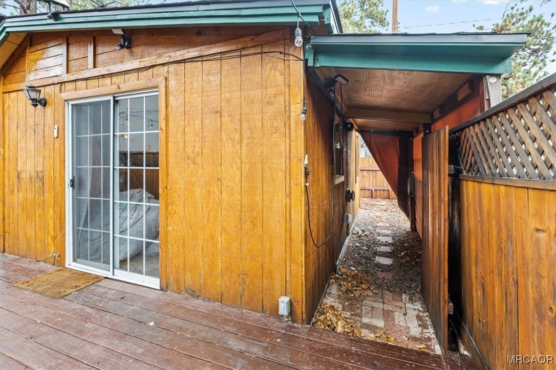 44361 Silver Pine Road Sugarloaf, CA 92386 - Photo 20 of 20 a view of a house with wooden floor and a window
