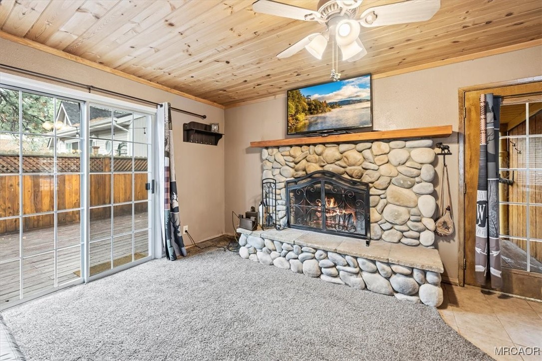44361 Silver Pine Road Sugarloaf, CA 92386 - Photo 5 of 20 a living room with a fireplace