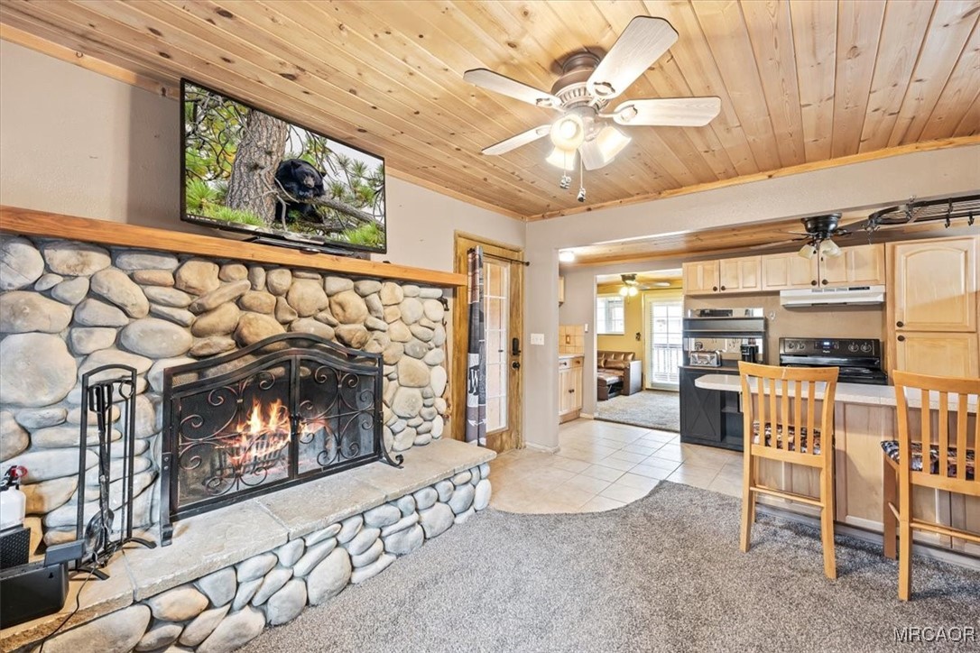 44361 Silver Pine Road Sugarloaf, CA 92386 - Photo 6 of 20 a living room with furniture and a fireplace
