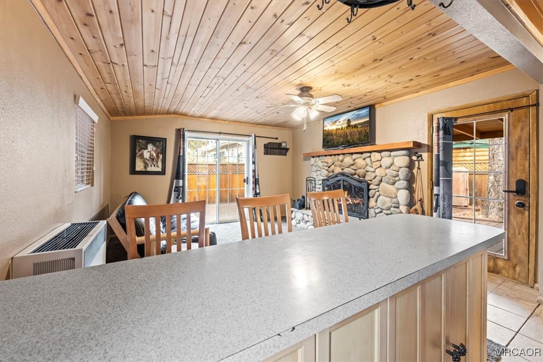 44361 Silver Pine Road Sugarloaf, CA 92386 - Photo 7 of 20 a view of a dining room with furniture window and outside view