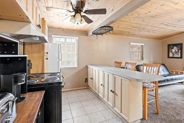a view of a hallway with windows