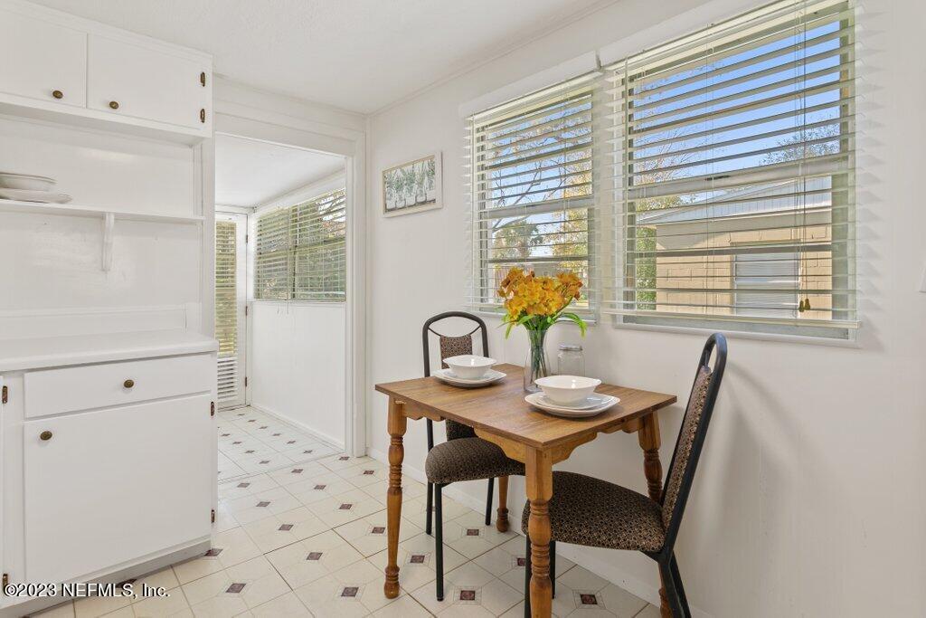 60 Jackson Road Atlantic Beach, FL 32233 - Photo 23 of 42 a view of a dining room with furniture and window