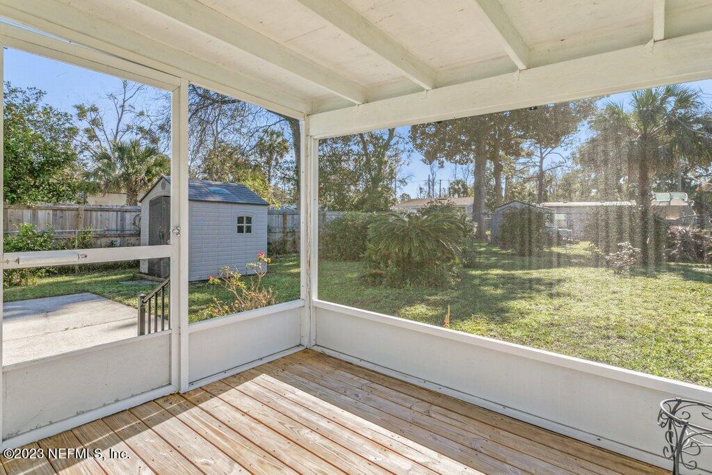 60 Jackson Road Atlantic Beach, FL 32233 - Photo 27 of 42 a view of a room with wooden floor and outdoor view