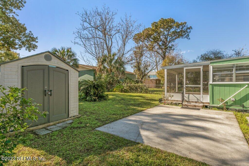 60 Jackson Road Atlantic Beach, FL 32233 - Photo 29 of 42 a view of a house with a yard and pathway