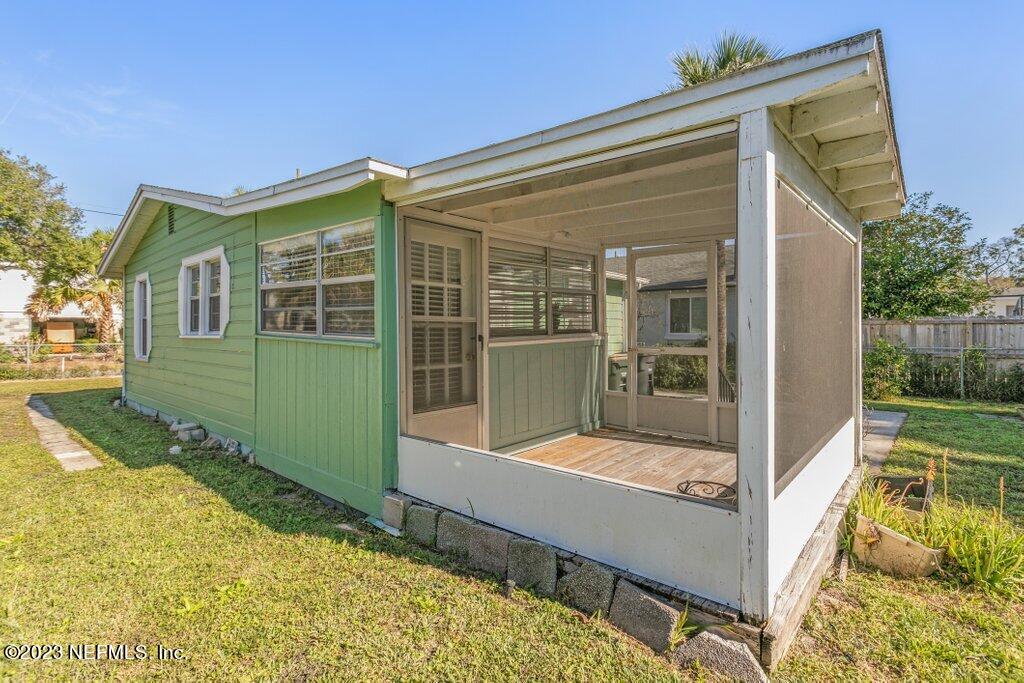 60 Jackson Road Atlantic Beach, FL 32233 - Photo 33 of 42 a view of house with backyard outdoor seating and tub