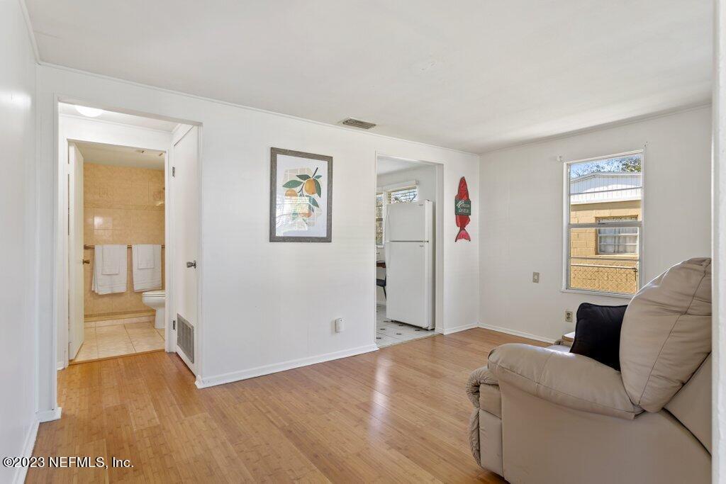 60 Jackson Road Atlantic Beach, FL 32233 - Photo 9 of 42 a living room with furniture and a window