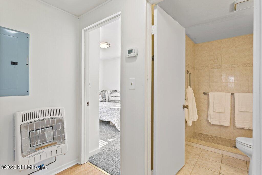 60 Jackson Road Atlantic Beach, FL 32233 - Photo 10 of 42 a bathroom with a glass door shower and a sink