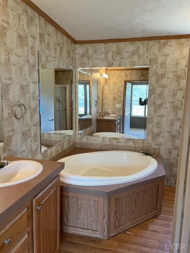 327 Rhodies Road Prospect, VA 23960 - Photo 14 of 18 a bath tub sitting in a bathroom next to a sink