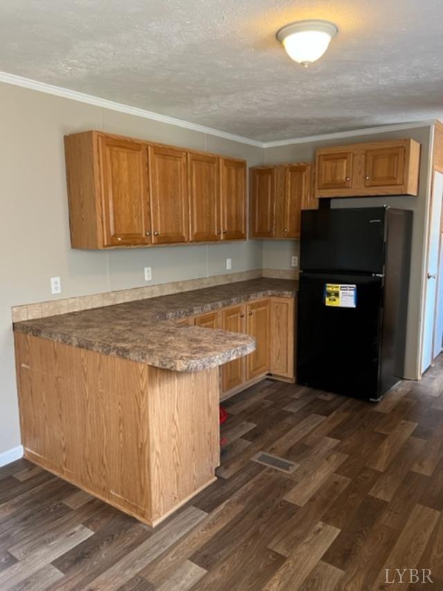 327 Rhodies Road Prospect, VA 23960 - Photo 3 of 18 a kitchen with granite countertop a refrigerator and a stove top oven