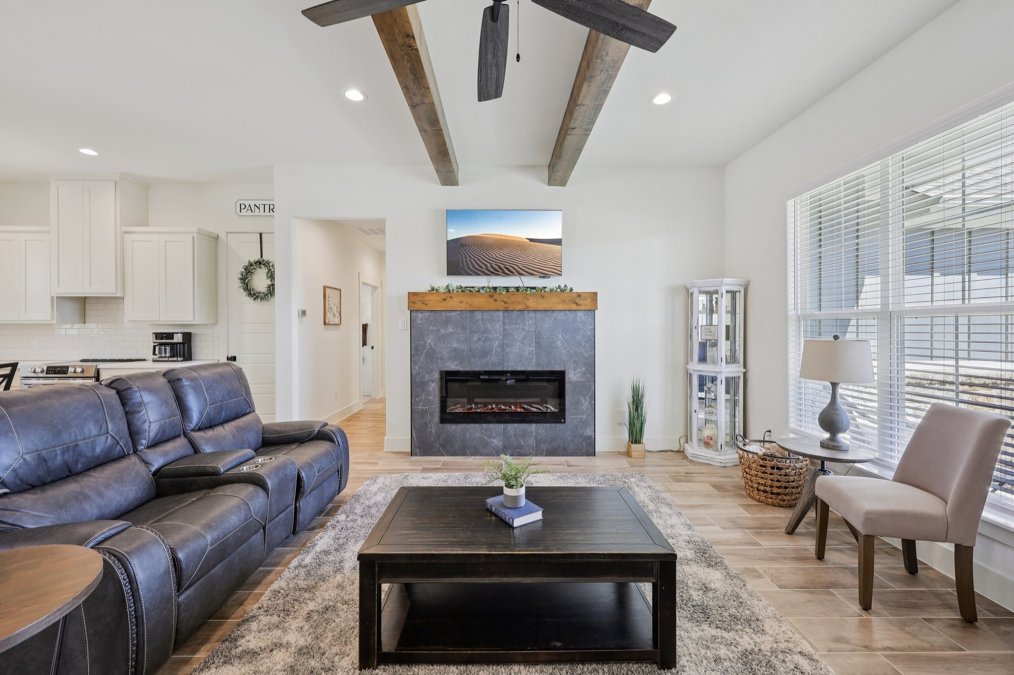 2032 Rattler Way Tolar, TX 76476 - Photo 11 of 49 a living room with furniture and a fireplace