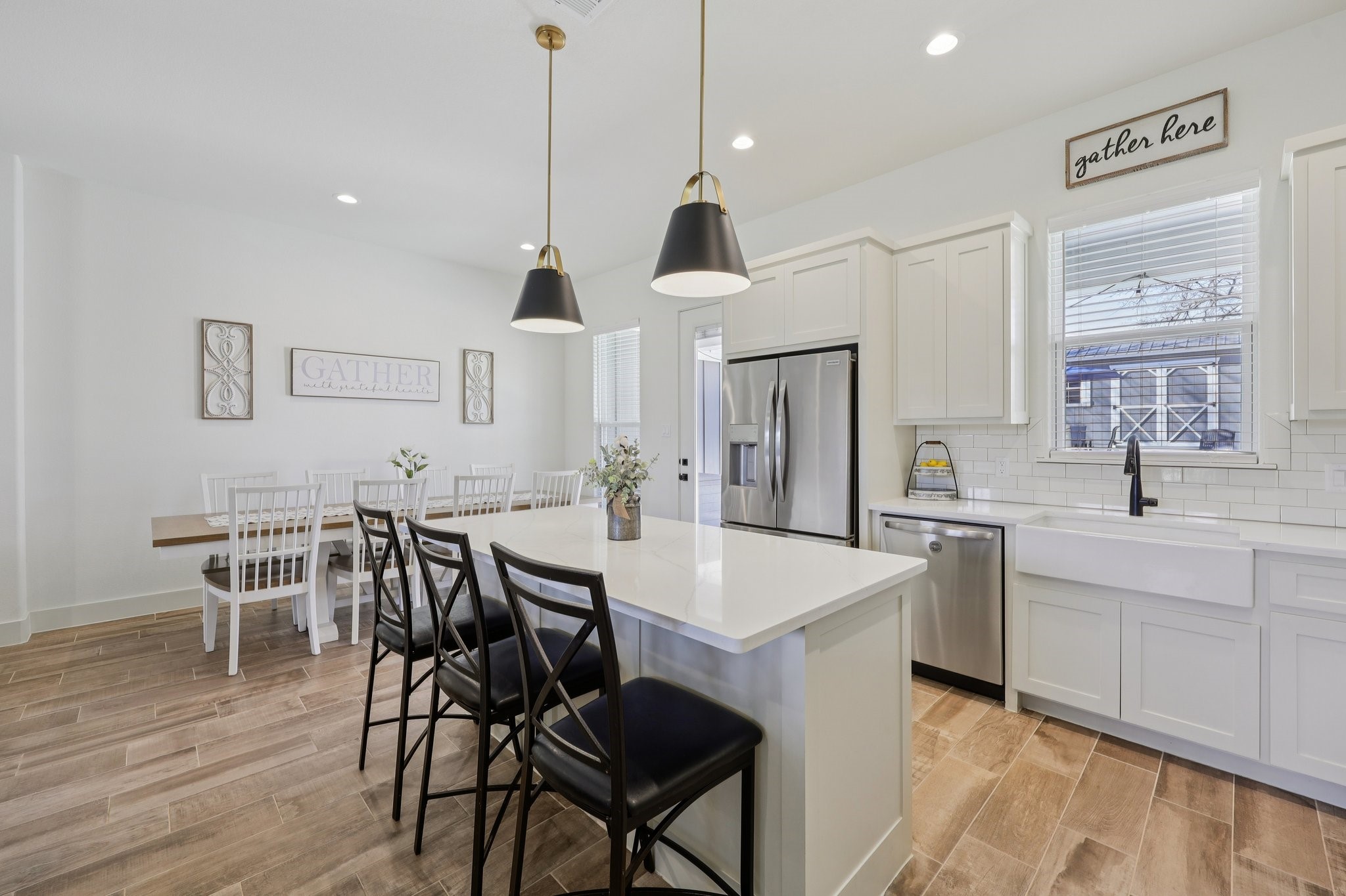2032 Rattler Way Tolar, TX 76476 - Photo 13 of 49 a view of a dining room with furniture and wooden floor