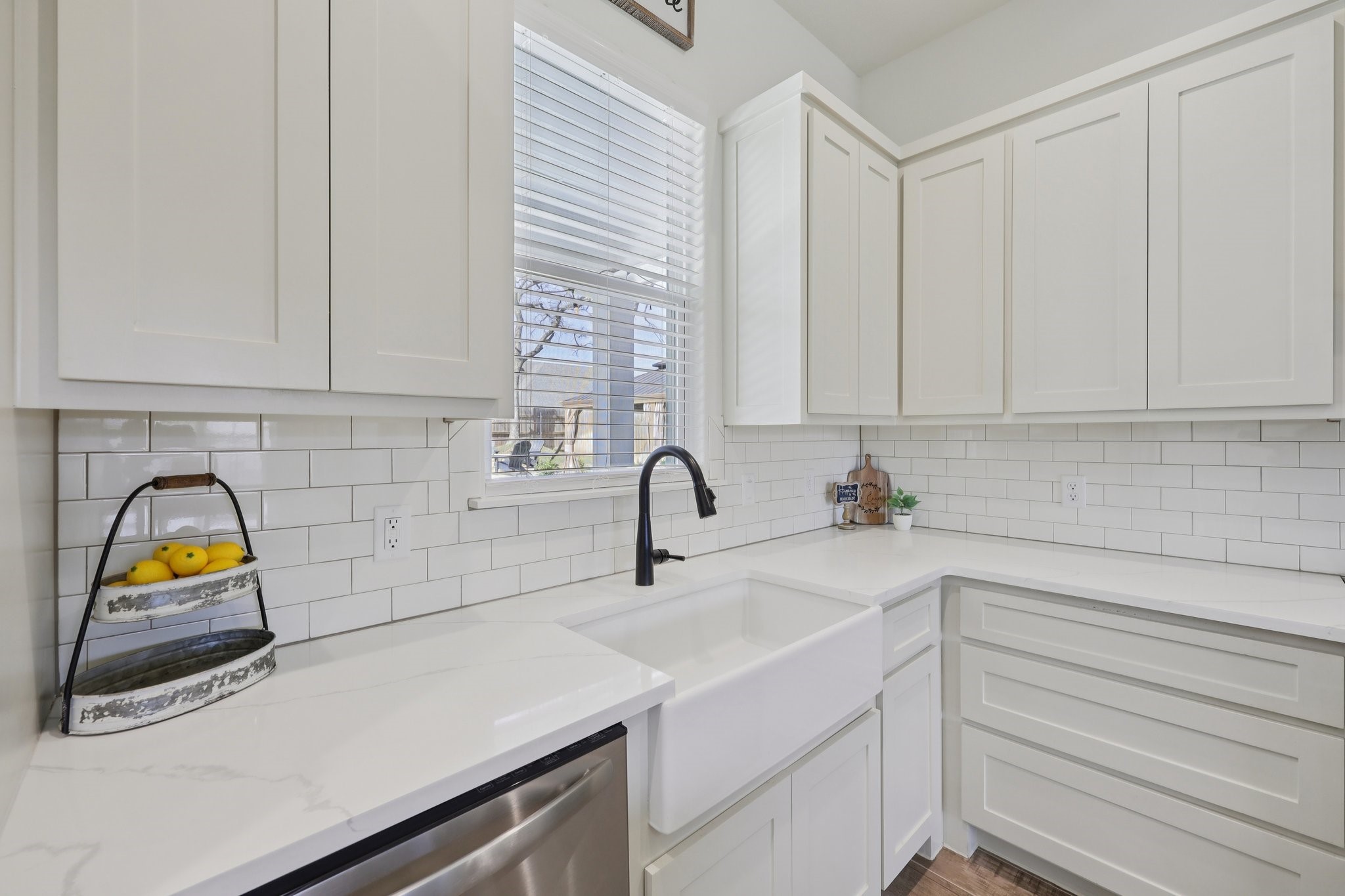 2032 Rattler Way Tolar, TX 76476 - Photo 16 of 49 a kitchen with a sink cabinets and appliances