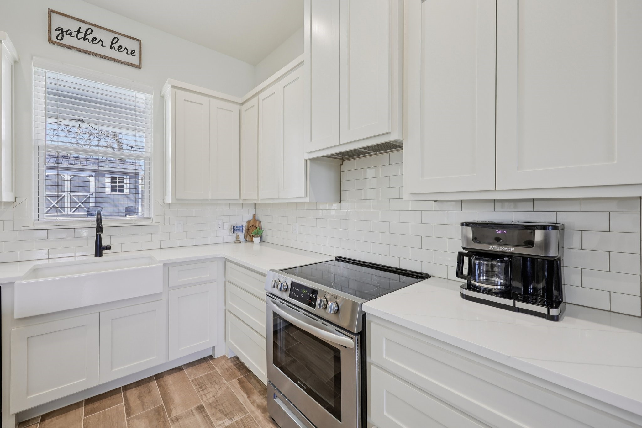 2032 Rattler Way Tolar, TX 76476 - Photo 17 of 49 a kitchen with cabinets appliances a sink and a window