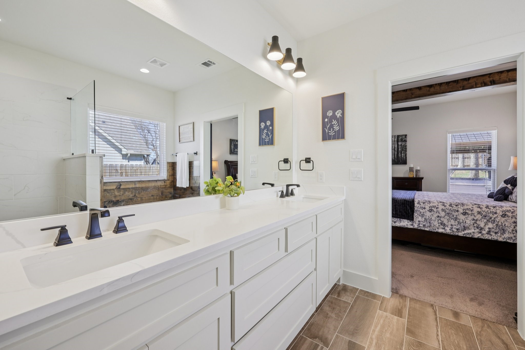 2032 Rattler Way Tolar, TX 76476 - Photo 24 of 49 a en suite bathroom with double vanity and mirrors