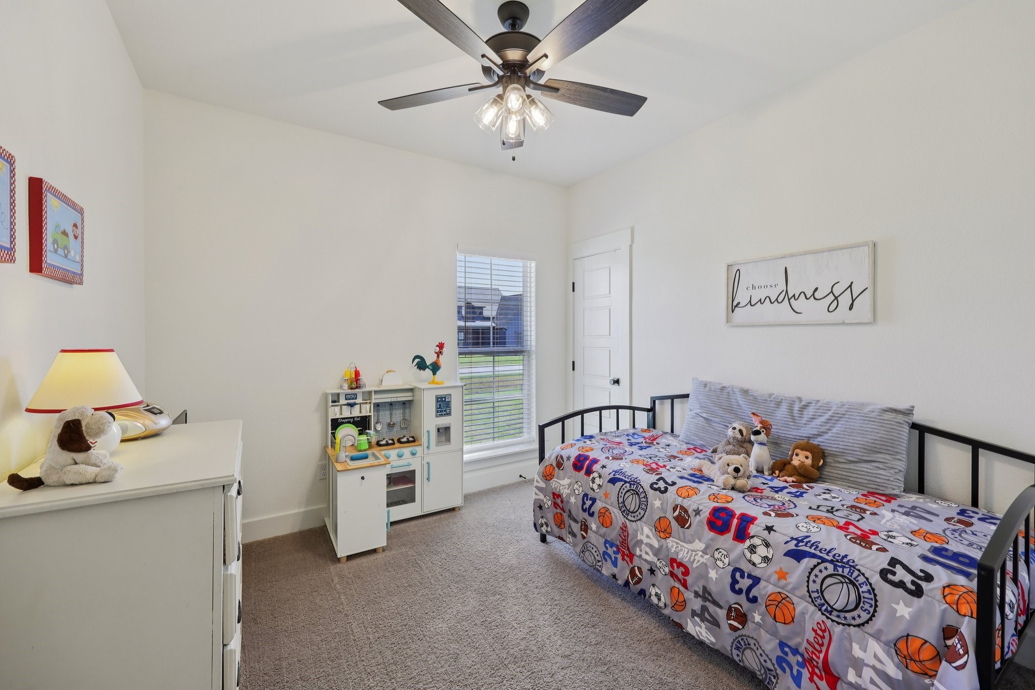 2032 Rattler Way Tolar, TX 76476 - Photo 25 of 49 a bedroom with a bed and a chandelier