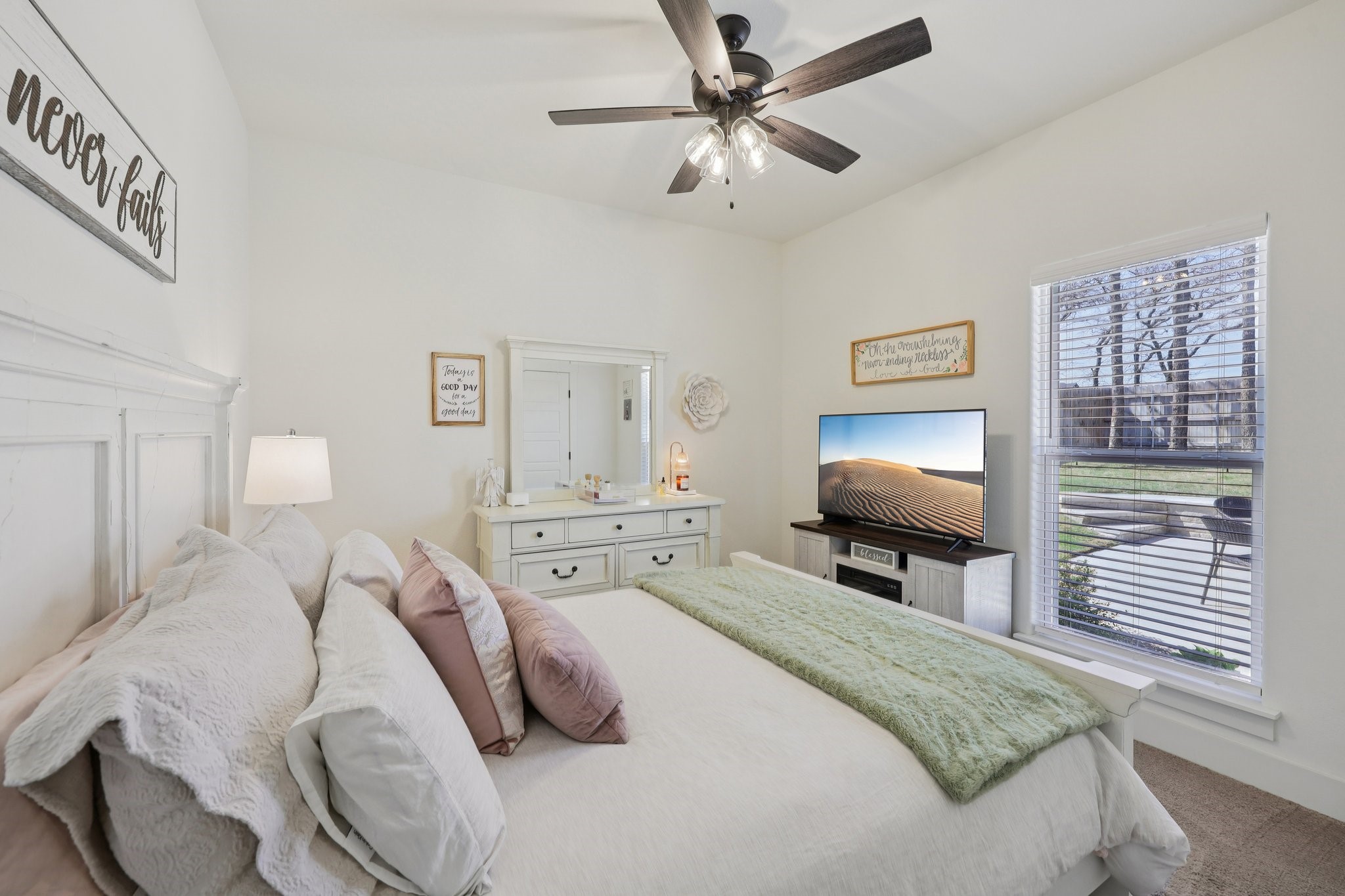 2032 Rattler Way Tolar, TX 76476 - Photo 27 of 49 a bedroom with a bed and a flat screen tv