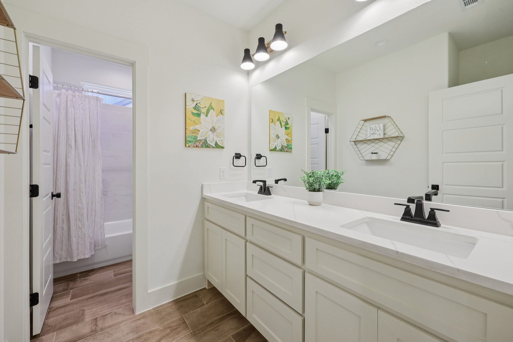 2032 Rattler Way Tolar, TX 76476 - Photo 29 of 49 a bathroom with a sink vanity and a mirror