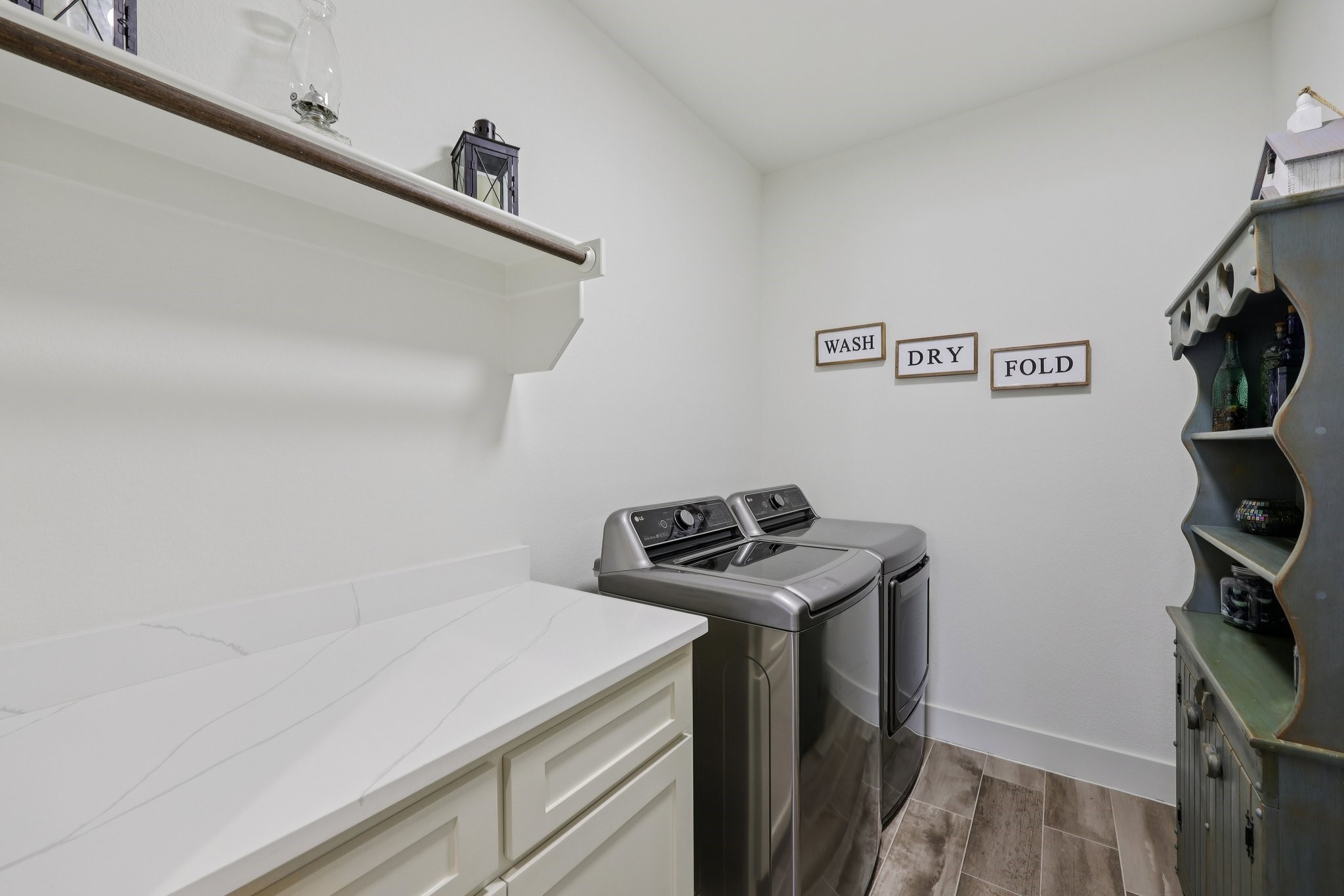 2032 Rattler Way Tolar, TX 76476 - Photo 32 of 49 a utility room with dryer and washer