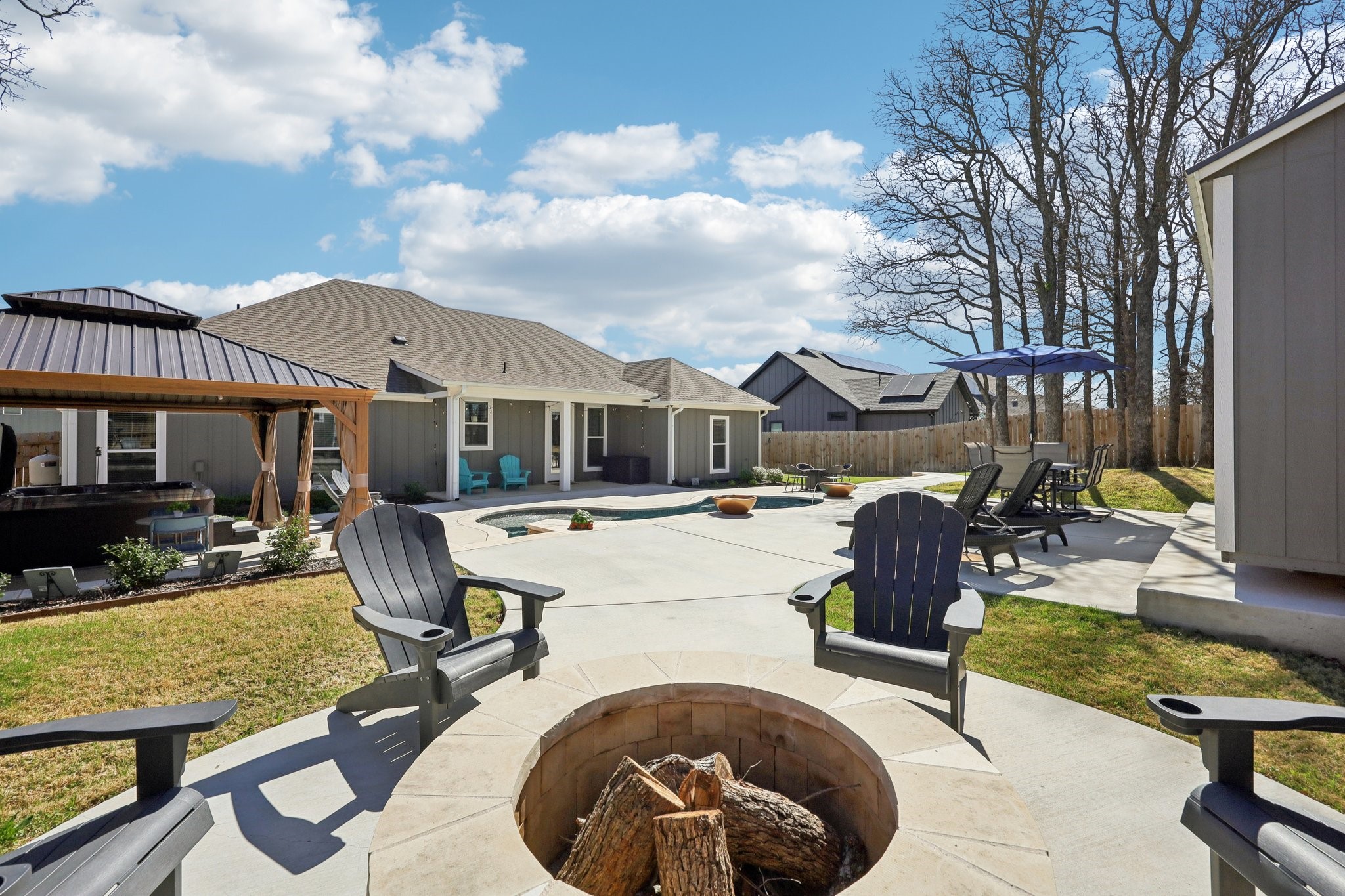 2032 Rattler Way Tolar, TX 76476 - Photo 36 of 49 a view of a house with swimming pool and sitting area