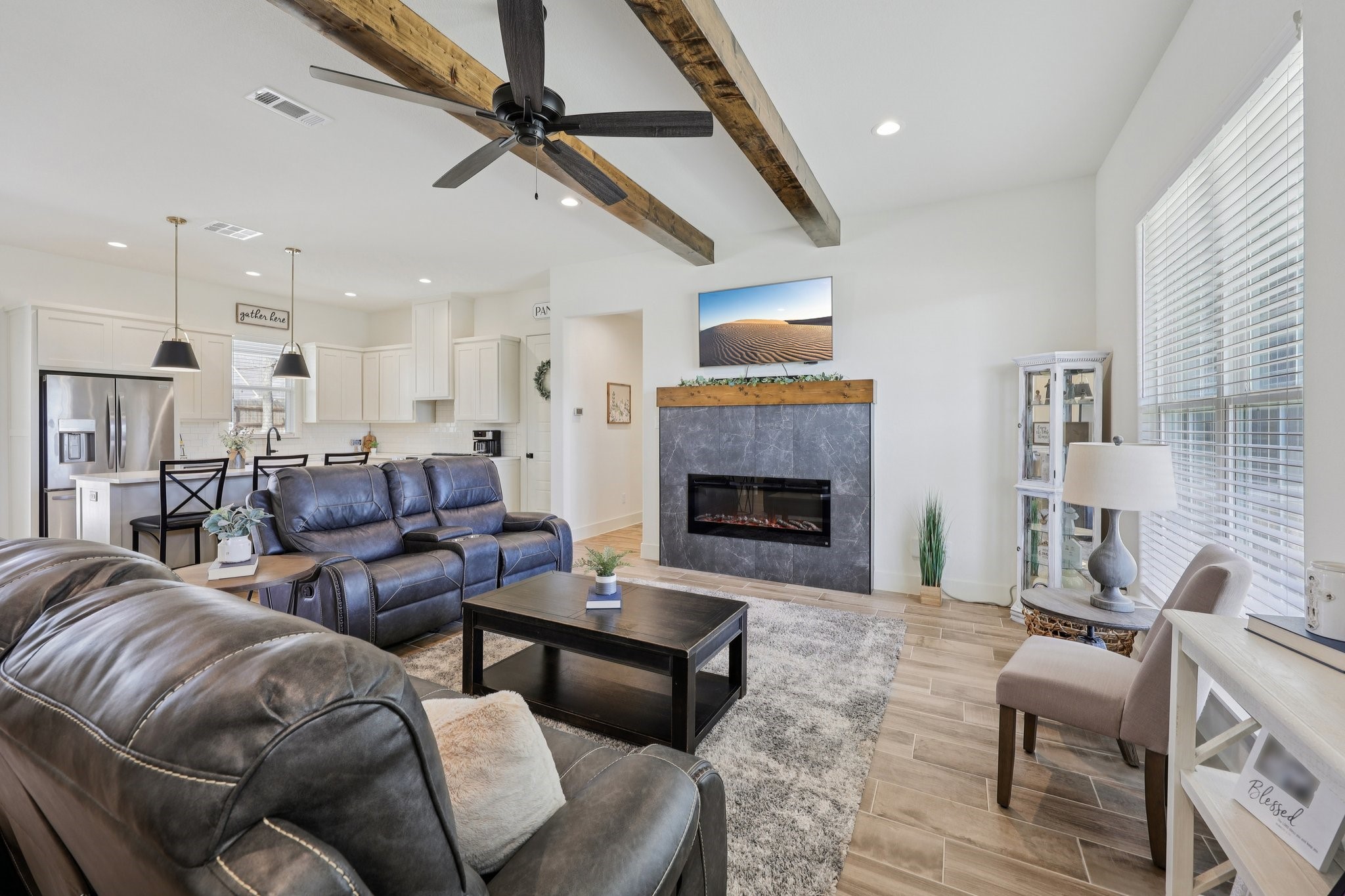 2032 Rattler Way Tolar, TX 76476 - Photo 4 of 49 a living room with furniture and a fireplace