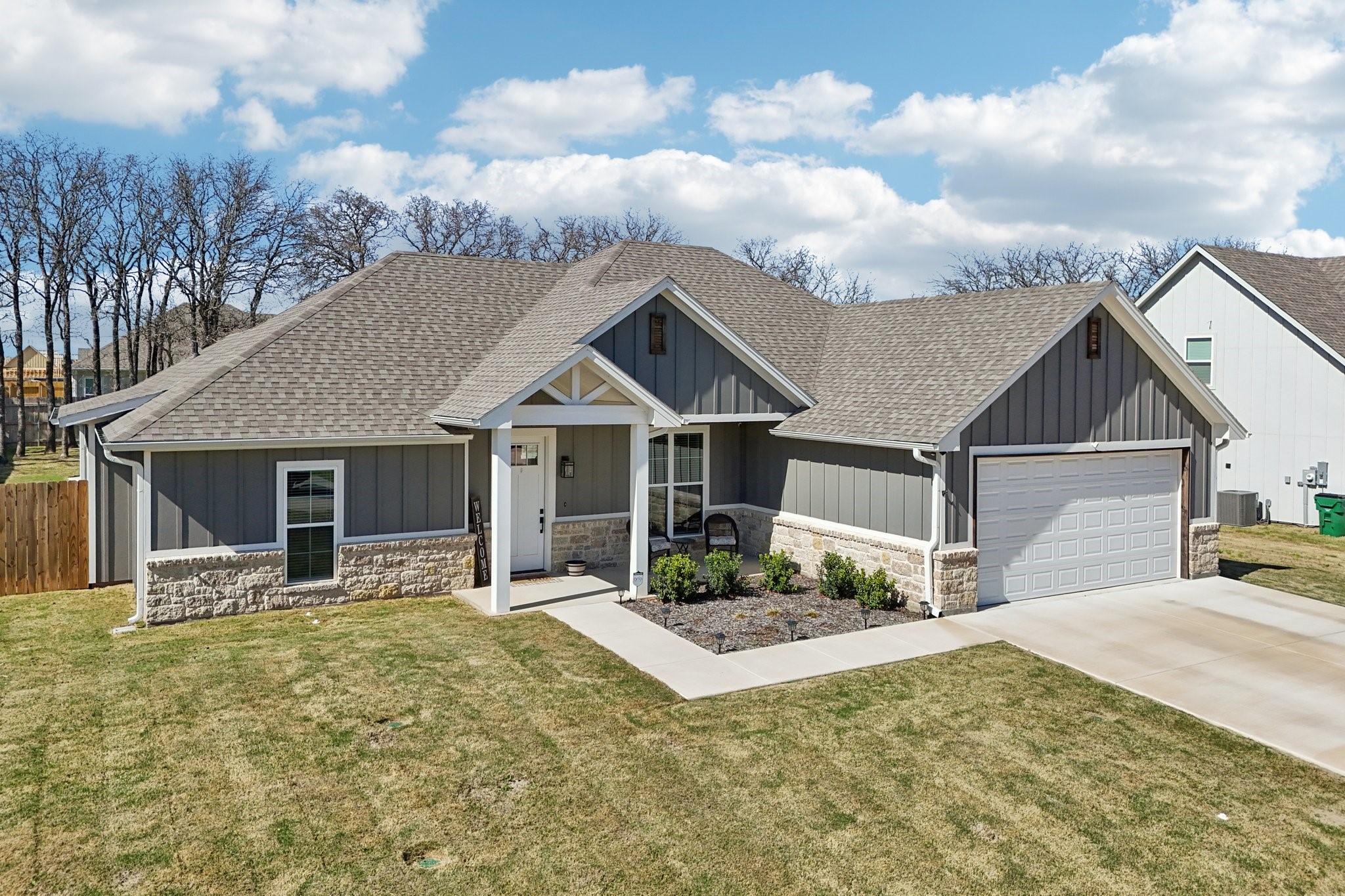 2032 Rattler Way Tolar, TX 76476 - Photo 43 of 49 a front view of a house with yard